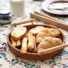 imageDECRAFTS Round Rattan Tray Woven Bread Basket with Handles Small Cracker Tray for Serving Dinner Parties Coffee Table Tea Natural 11 inches Diameter11 inch